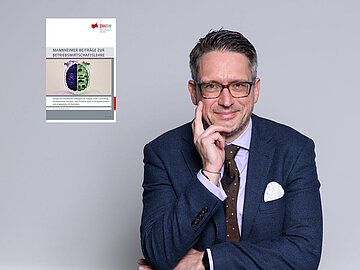 Bild mit grauem Hintergrund, Prof. Dr. Jonen schaut lächelnd, neben ihm die Grafik seiner neuen Publikation.