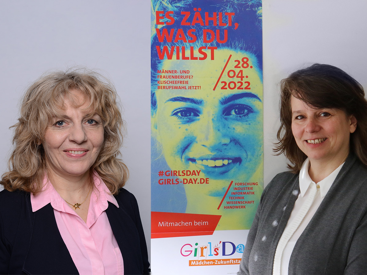 Porträts Prof. Dr. Lilit Mkrtchyan und Prof. Dr. Alexandra Dunz vor einem Girls'Day-Plakat.